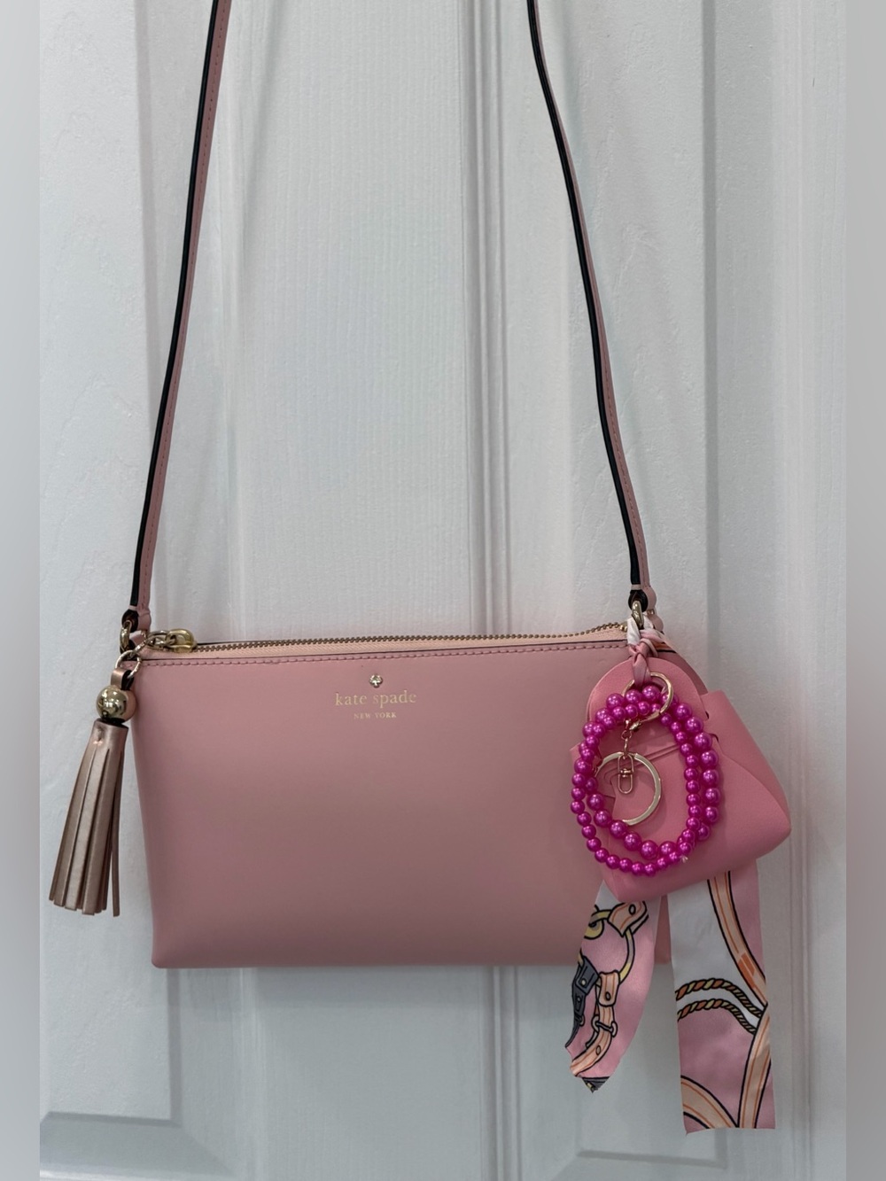 kate spade Pink Leather Crossbody with Tassel & Charm